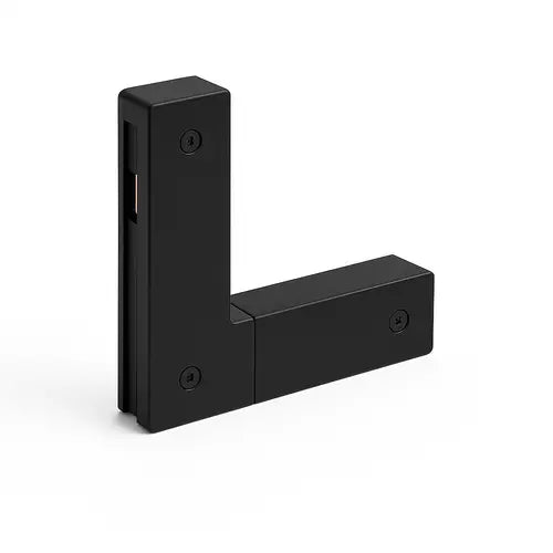 Connettore accessorio nero per sistema di illuminazione magnetico 48V, su sfondo bianco