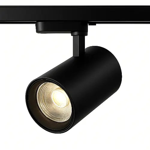 Faretto LED nero montato su binario 220V, vista laterale su sfondo bianco