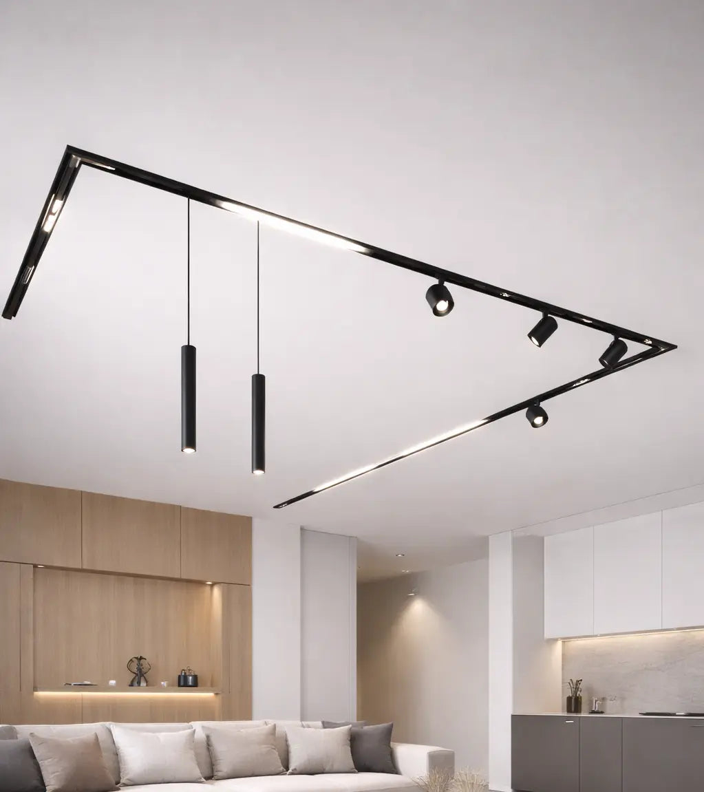 Sistema magnetico modulare a soffitto con linea LED, spot orientabili e sospensioni in configurazione combinata
